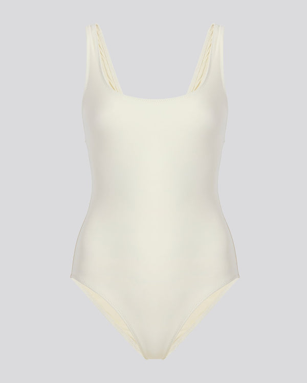 a white Anne-Marie one piece swimwear costume